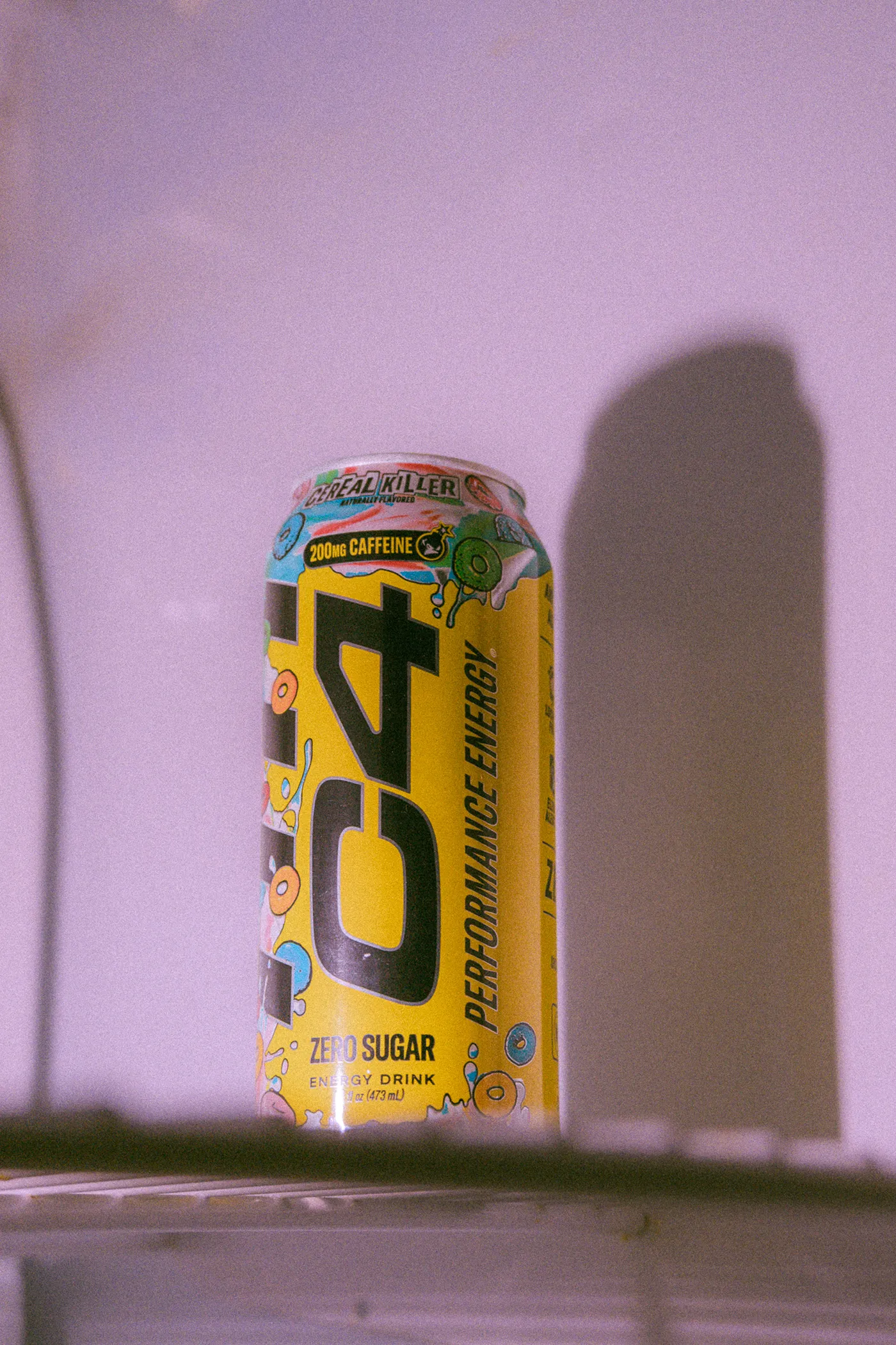 C4 Cereal Killer can on a refrigerator shelf